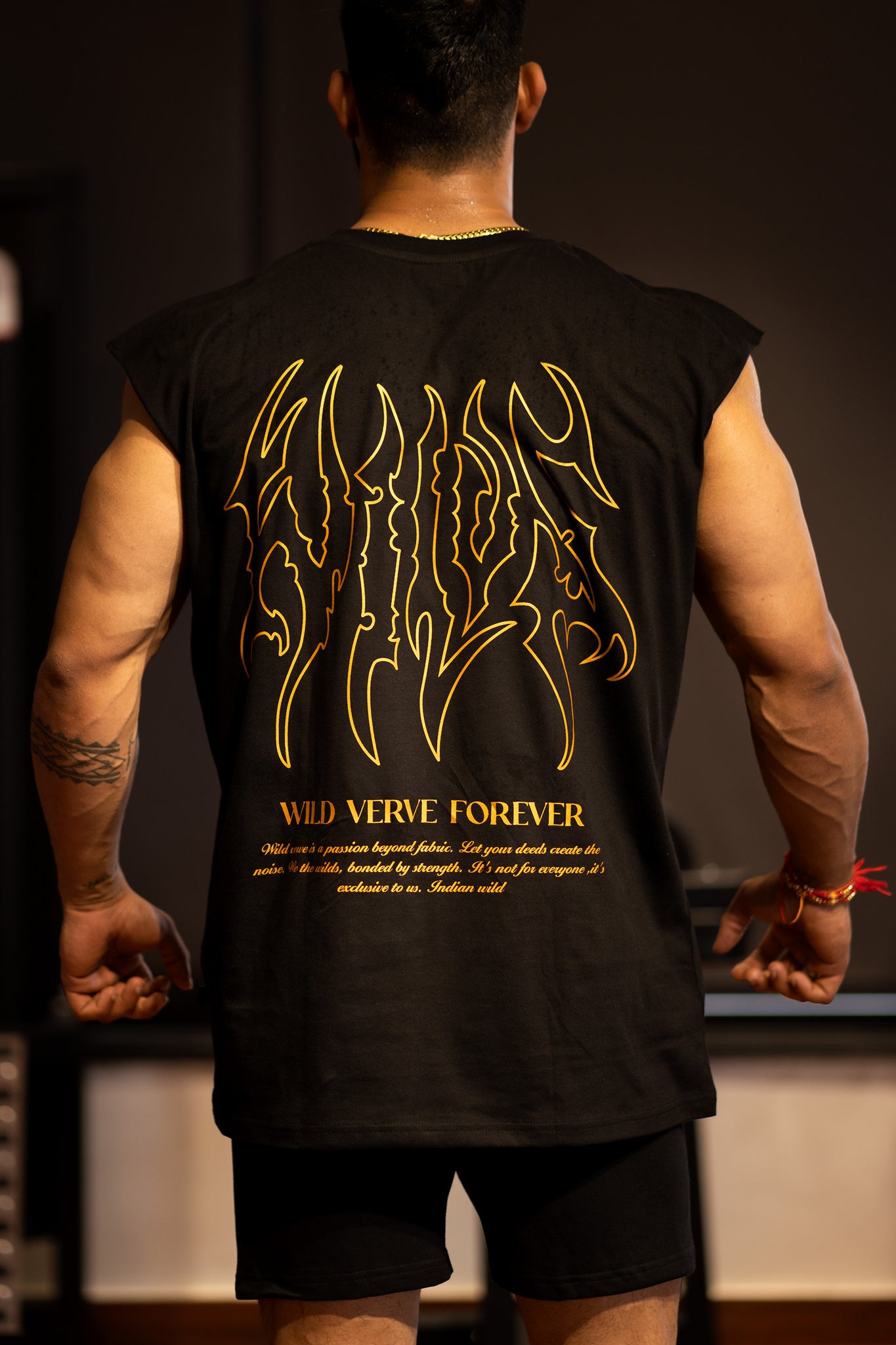 WILDS FLAME "PREMIUM" MUSCLE TEE IN BLACK (GOLD PRINT)